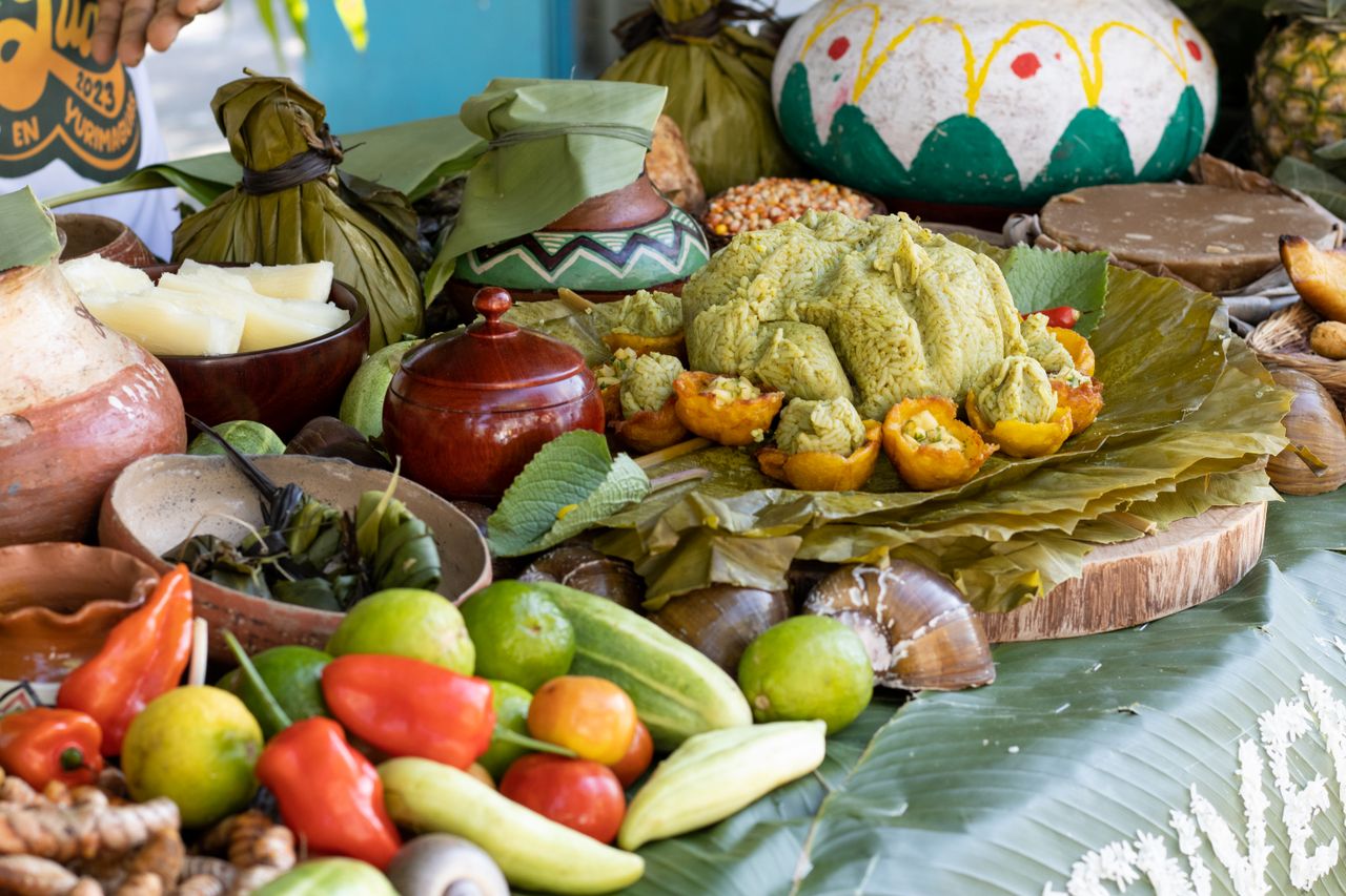Traditional Amazonian cuisine featuring juane and local produce in Yurimaguas, Peru.