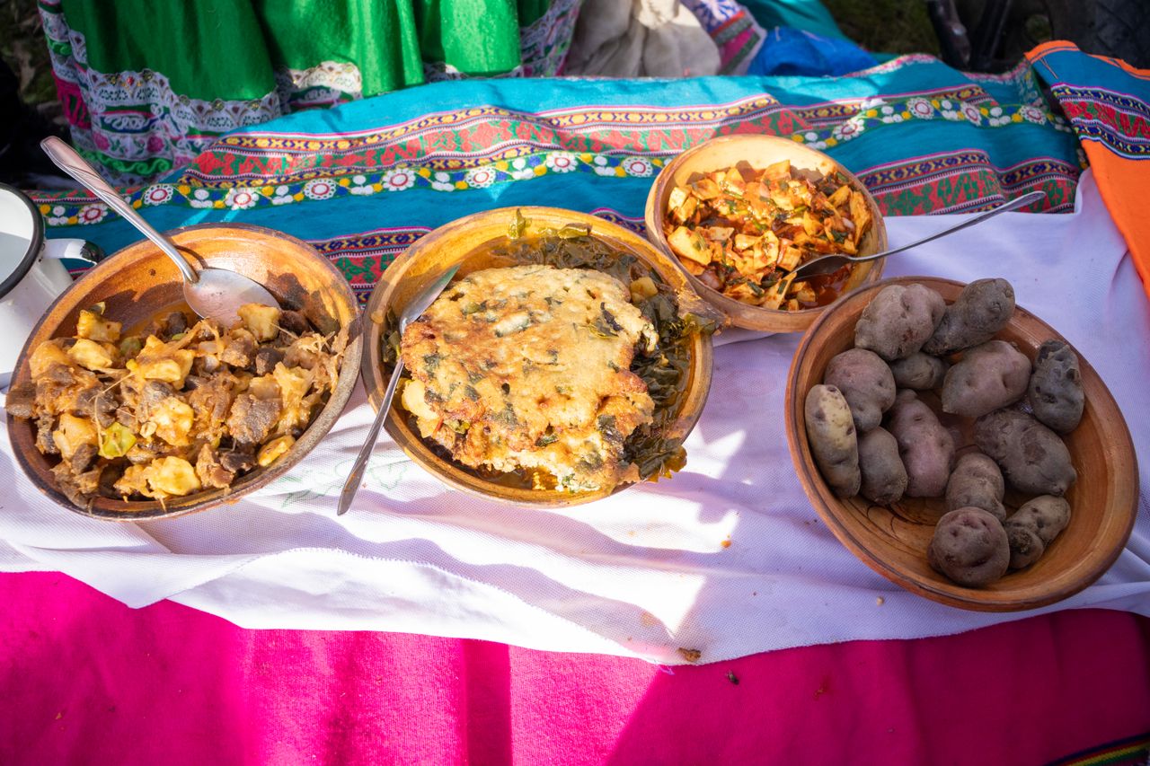 Explore the vibrant flavors of Peruvian cuisine with traditional dishes in a colorful Arequipa market setting.